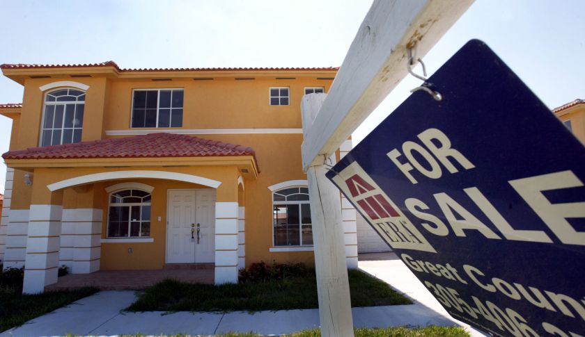 MIAMI, FL - MAY 27: A "For Sale" sign sits in front of a new home May 27, 2004 in Miami, Florida. According to the Commerce Department new home sales in the United States suffered their largest monthly drop in 10 years in April as rising mortgage rates cooled the housing market from the previous month. New home sales fell 11.8 percent to a seasonally adjusted annual rate of 1.093 million units from an upwardly revised record high of 1.239 million in March. (Photo by Joe Raedle/Getty Images)